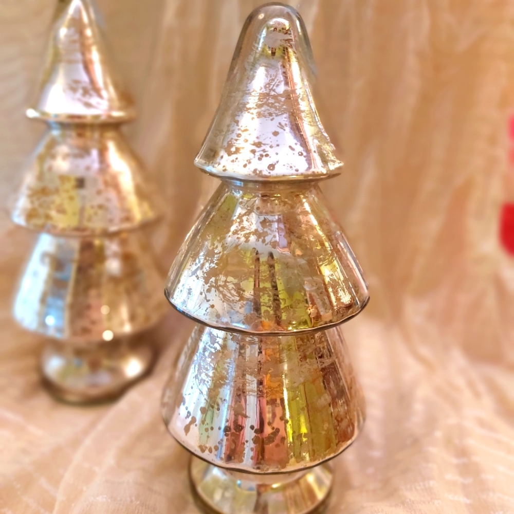 Mercury glass tree and silver reindeer holiday decoration